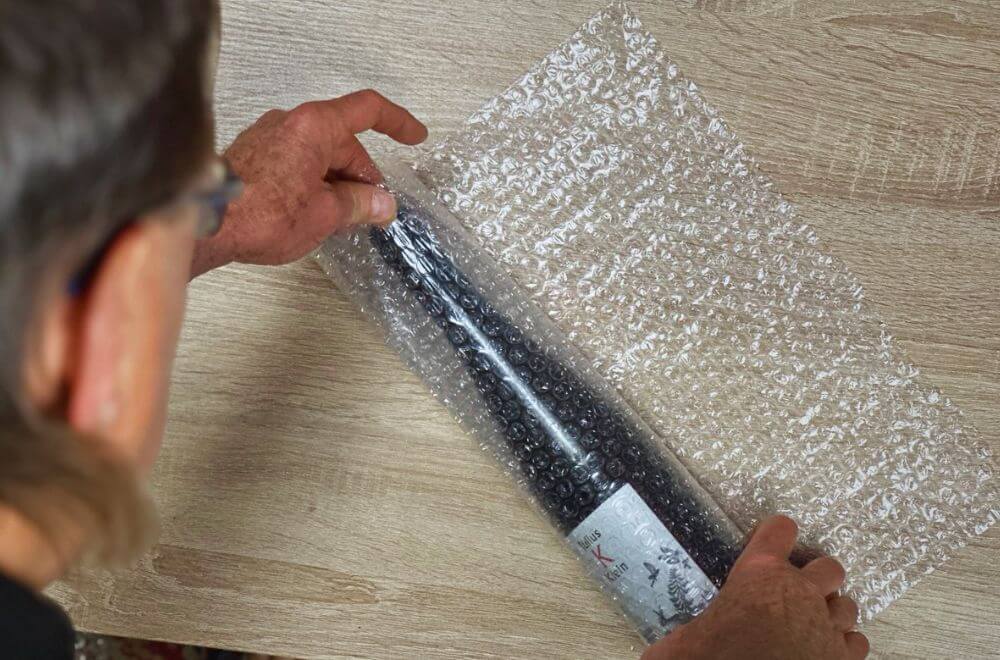 Lahev zabalená v bublinkové fólii